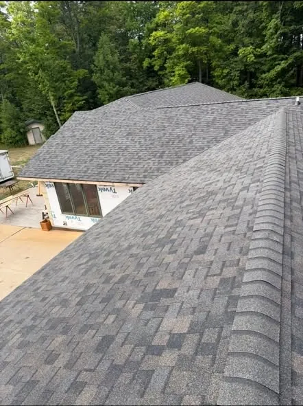 New architectural shingle roof with ridge cap